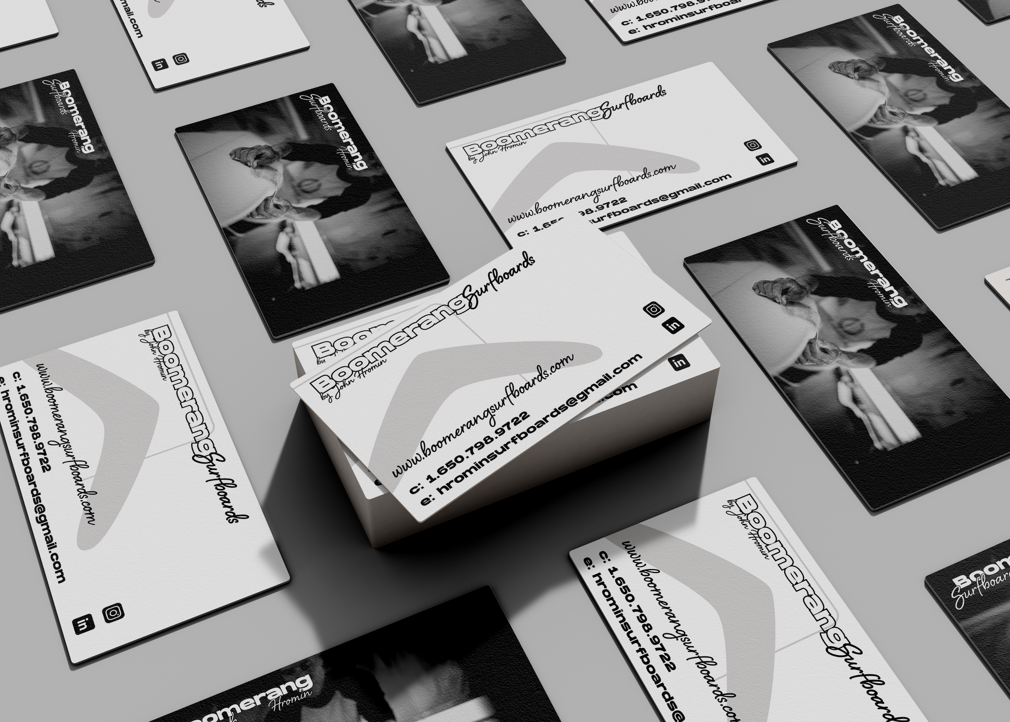 Boomerang Surfboards business cards mockup — black and white flat lay with stacked card pile